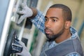 Man installing glass window Royalty Free Stock Photo