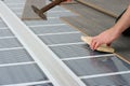 Man installing laminate floor