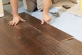 Man Installing New Laminate Wood Flooring Royalty Free Stock Photo