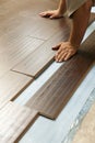 Man Installing New Laminate Wood Flooring Royalty Free Stock Photo