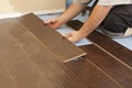 Man Installing New Laminate Wood Flooring Royalty Free Stock Photo