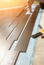 Man Installing New Laminate Wood Flooring Royalty Free Stock Photo