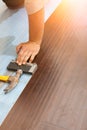 Man Installing New Laminate Wood Flooring Royalty Free Stock Photo