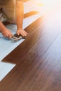 Man Installing New Laminate Wood Flooring Royalty Free Stock Photo