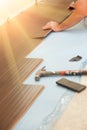 Man Installing New Laminate Wood Flooring Royalty Free Stock Photo