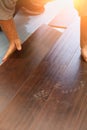 Man Installing New Laminate Wood Flooring Royalty Free Stock Photo