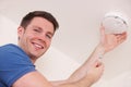 Man Installing Smoke Or Carbon Monoxide Detector Royalty Free Stock Photo