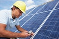 Man installing solar panels Royalty Free Stock Photo