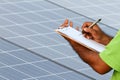 Man installing solar panels Royalty Free Stock Photo