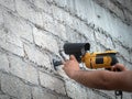 man installing surveillance camera on a wall Royalty Free Stock Photo