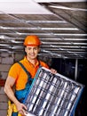 Man installing suspended ceiling