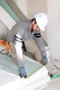 Man installing wall panels Royalty Free Stock Photo