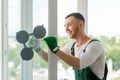 Man installing a window unit Royalty Free Stock Photo