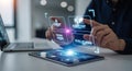 Man Interacting with Futuristic Digital Interface on Tablet and Laptop Royalty Free Stock Photo