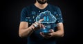 Man Interacting with Glowing Cloud Data Network: Modern Tech Scene Royalty Free Stock Photo