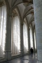 Man in interior of breda cathedral in holland