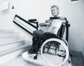 Man in an invalid chair Royalty Free Stock Photo