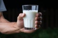 Man invites everyone to strengthen with calcium, holding a milk glass