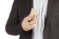 Man in jacket with mobile phone in hand isolated on white background. A guy in a business suit with a smartphone close-up. Royalty Free Stock Photo