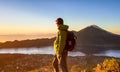 Bangli - A man enjoying sunrise on Mt Batur