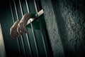 Man in jail hands close-up Royalty Free Stock Photo