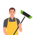 Man janitor uniform with broom in one hand. Cleaning worker