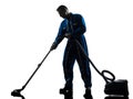Man janitor vaccum cleaner cleaning silhouette