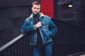 Man in jeans and denim jacket Royalty Free Stock Photo