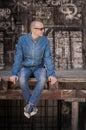 Man in jeans on graffiti background Royalty Free Stock Photo
