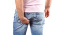 Man in jeans scratching hand his itchy bottom Royalty Free Stock Photo