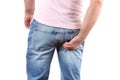 Man in jeans scratching hand his itchy Royalty Free Stock Photo