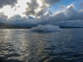 Man on jet ski turns with much splashes. Teen age boy skiing on water scooter. Young man on personal watercraft in tropical sea. A