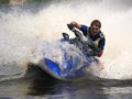 Man on jet-ski turns very fast with diving Royalty Free Stock Photo