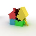 Man With Jigsaw House Royalty Free Stock Photo