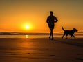 A man is jogging by the beach while being accompanied by his beloved dog. Royalty Free Stock Photo