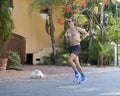 Man jogging in Puerto Aventuras, Mexico