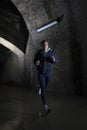 Man Jogging Through Urban Tunnel At Night Royalty Free Stock Photo