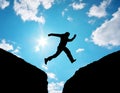 Man jump through the gap. Royalty Free Stock Photo