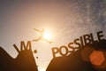 Man jump between impossible wording and possible wording on mountain. Mindset for career growth business Royalty Free Stock Photo