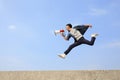 Man jump and shout megaphone Royalty Free Stock Photo