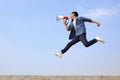 Man jump and shout megaphone Royalty Free Stock Photo