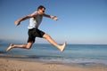 Man jumping on the beach Royalty Free Stock Photo