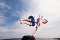 Man jumping on the beach on sky background Royalty Free Stock Photo