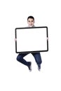 Man jumping with blank sign Royalty Free Stock Photo