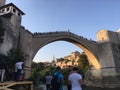 Man jumping from bridge