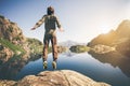 Man jumping Flying levitation with lake and mountains on background Royalty Free Stock Photo