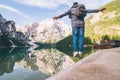 man jumping at lake beach of mountain lake Royalty Free Stock Photo