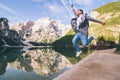 Man jumping at lake beach of mountain lake Royalty Free Stock Photo