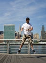 Man jumping and looking at his watch in New York Royalty Free Stock Photo