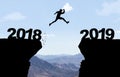 Man jumping over abyss with text 2018/2019 Royalty Free Stock Photo